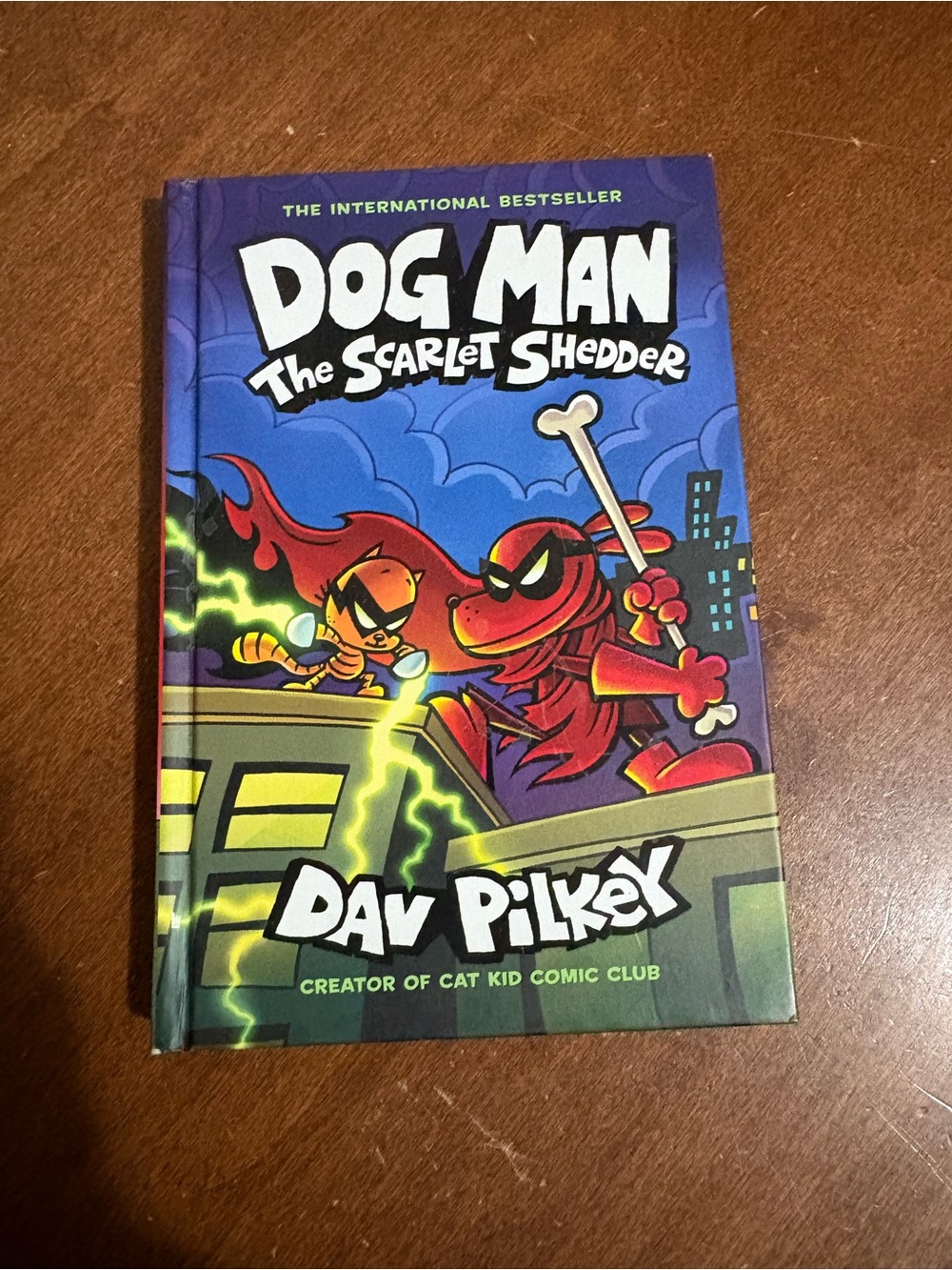 Scholastic Dog Man Hardcover with Blue and Red Comic